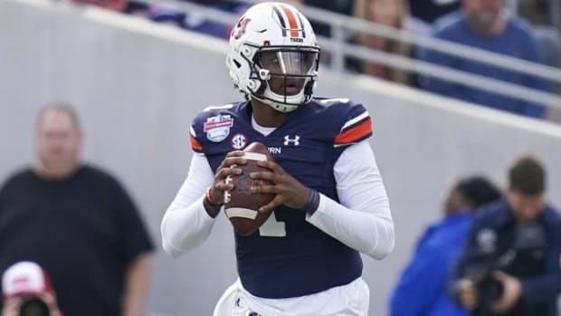 Auburn quarterback T.J. Finley drops back to pass in the Birmingham Bowl vs. Houston.